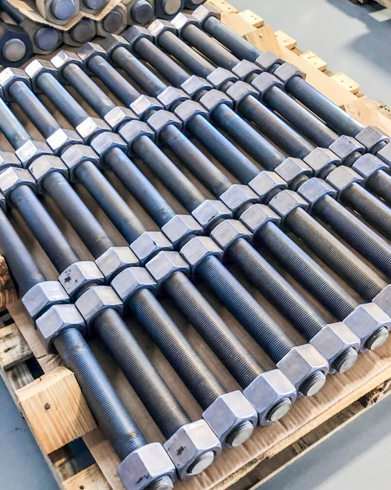 Modumetal nanolaminated bolts with nuts.